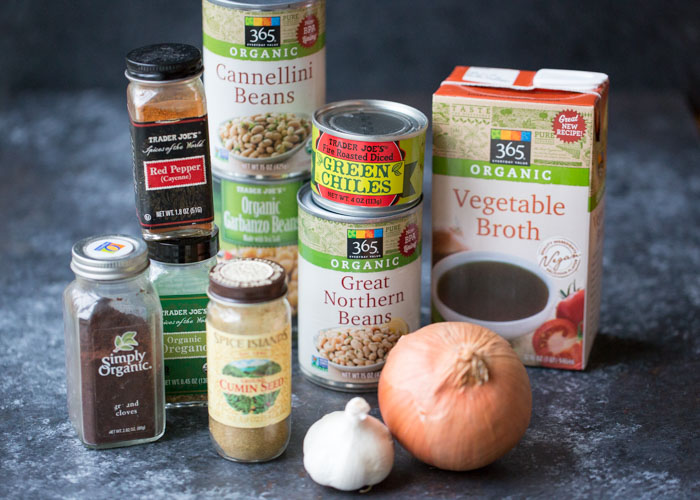 20-Minute Vegetarian White Bean Chili - I'm always surprised by how complex this tastes considering it only takes 20 minutes! Three kinds of beans add interest to this simple (and fast) vegetarian/vegan white bean chili recipe. A weeknight go-to around here! #whitebeanchili