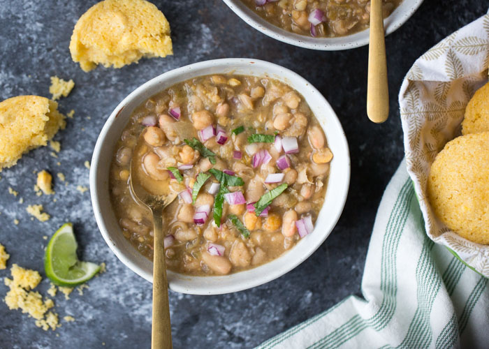 20-Minute Vegetarian White Bean Chili - I'm always surprised by how complex this tastes considering it only takes 20 minutes! Three kinds of beans add interest to this simple (and fast) vegetarian/vegan white bean chili recipe. A weeknight go-to around here! #whitebeanchili