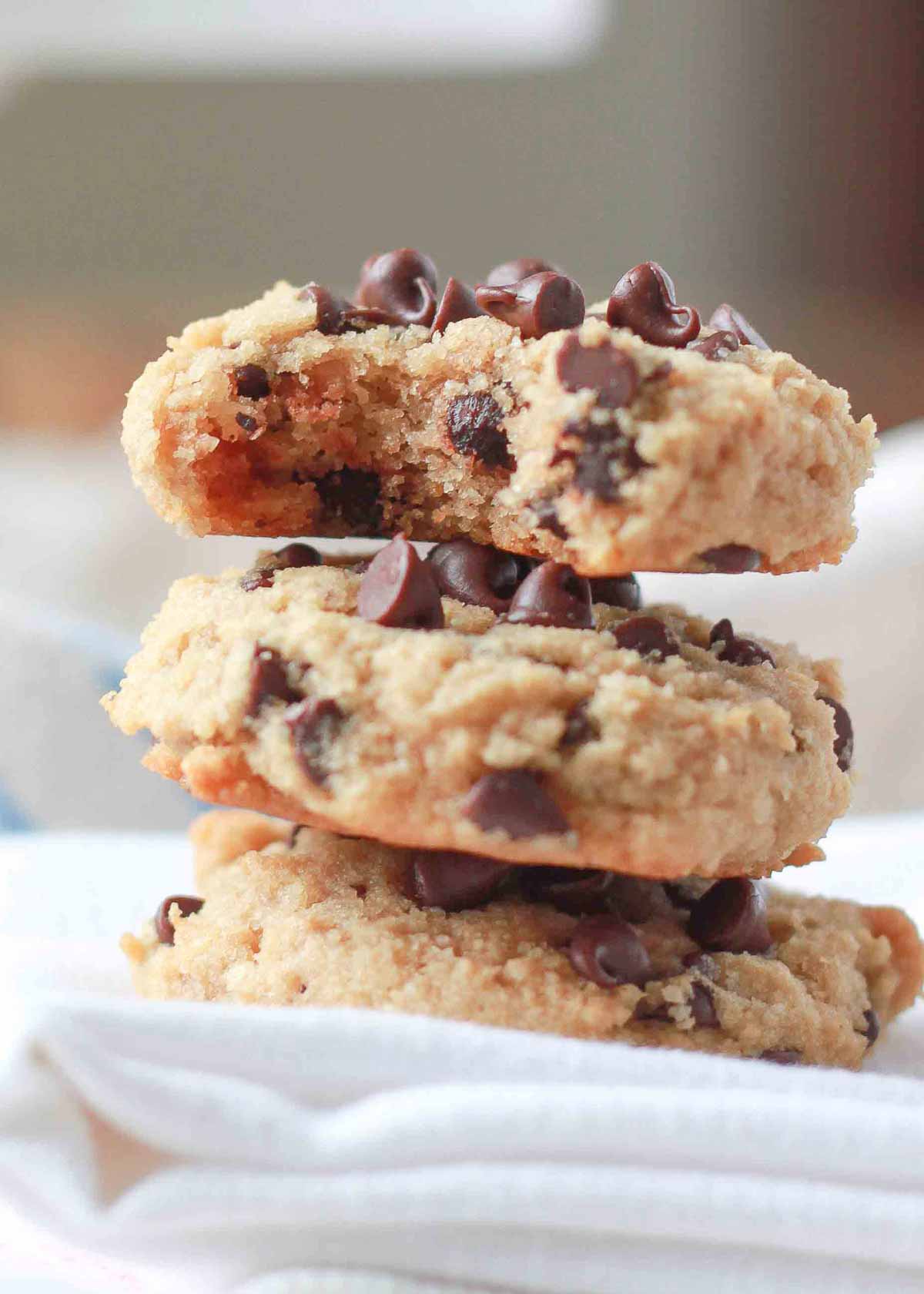 A stack of three Soft-Baked Almond Flour Chocolate Chip Cookies