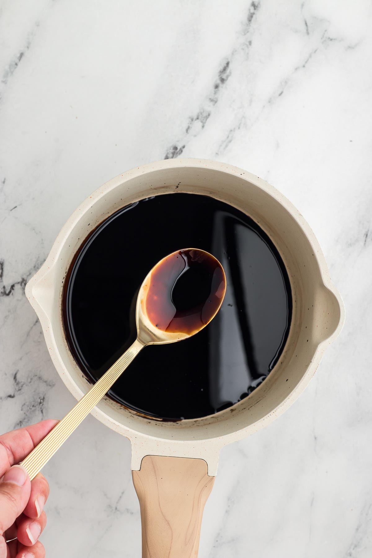 checking for thickness when making balsamic glaze