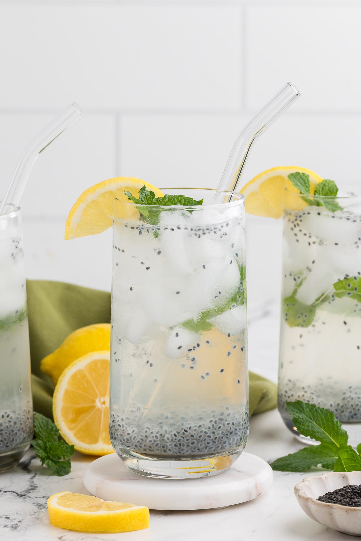 three glasses full of lemon basil seed drink