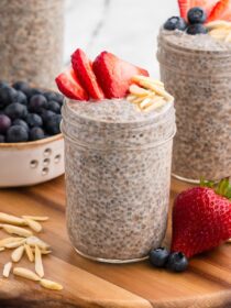 three jars of basil seed pudding with fruit