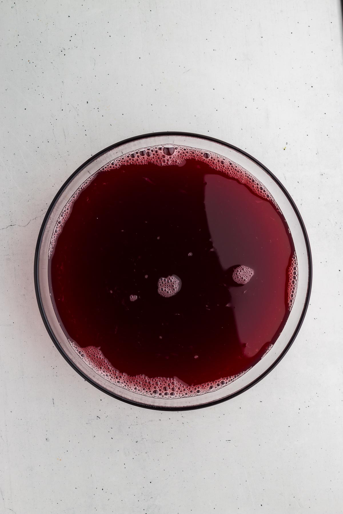 mixing together Black Magic Halloween Punch