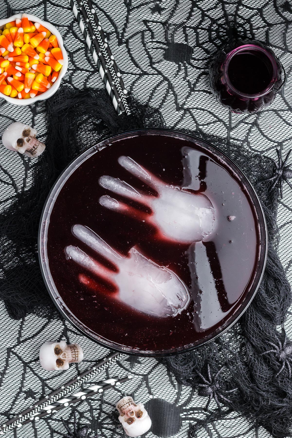 Black Magic Halloween Punch with ice hands