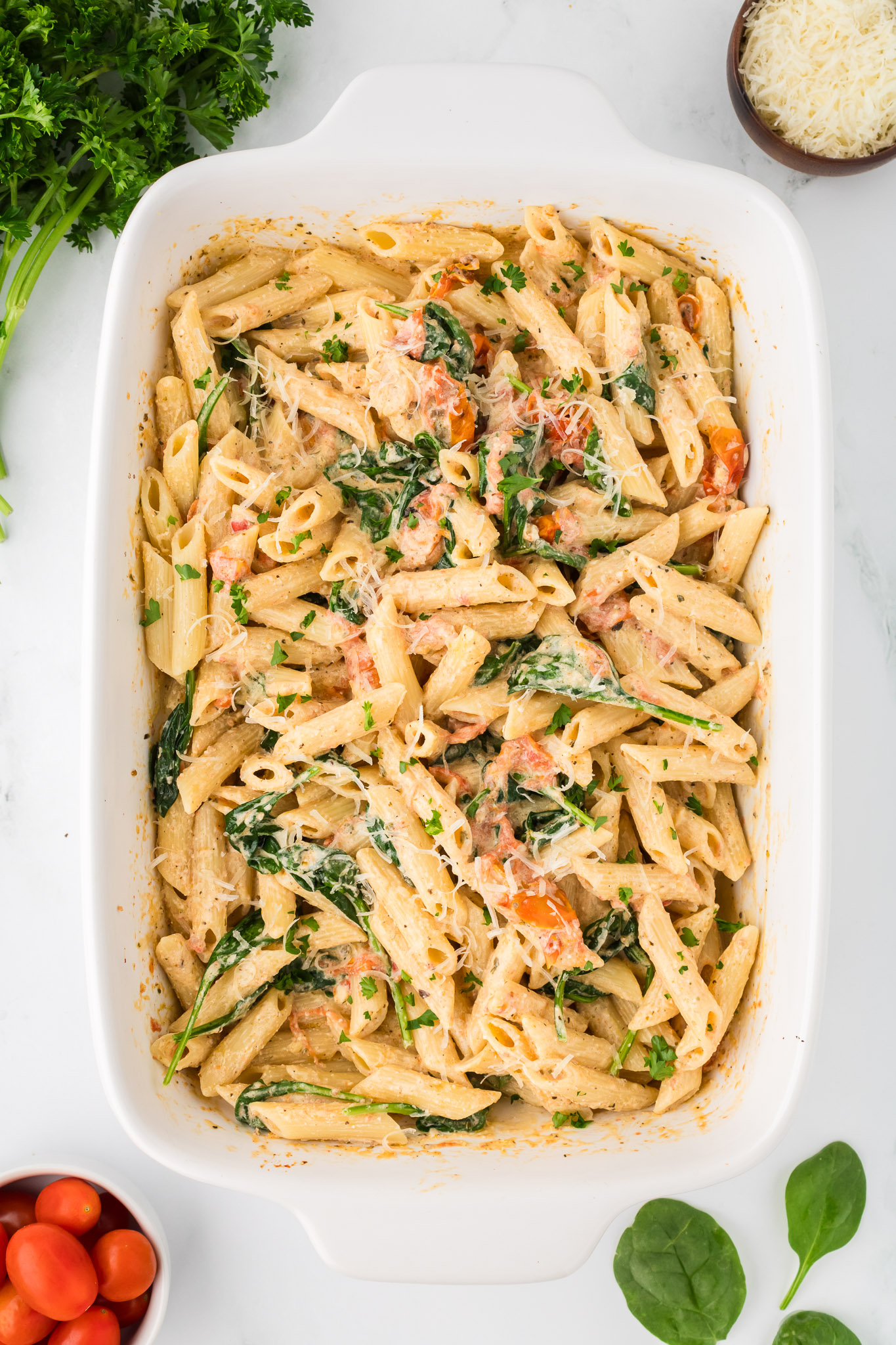 A white baking dish full of Boursin pasta.