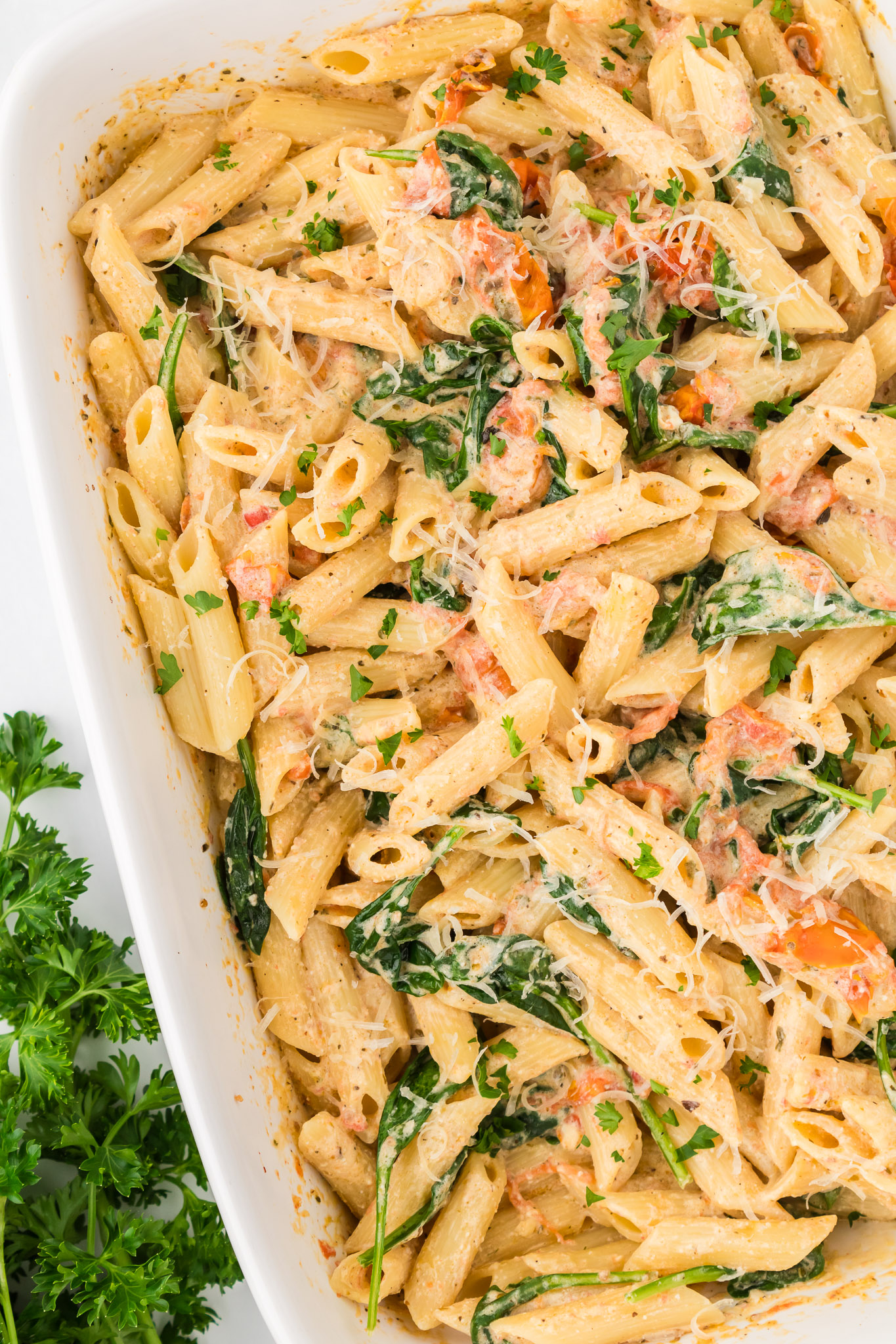 A white baking dish full of Boursin pasta.