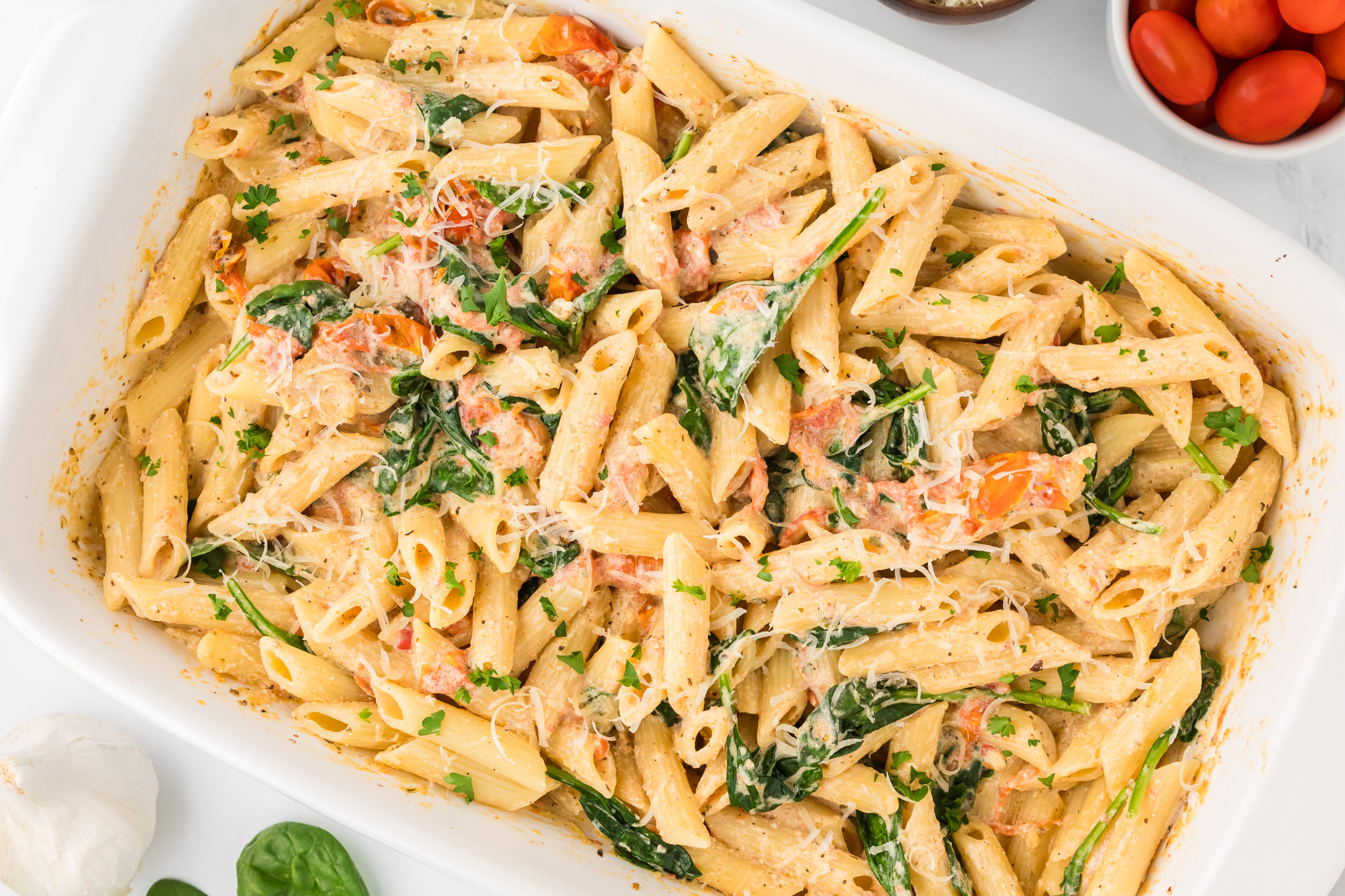 A white baking dish full of Boursin pasta.