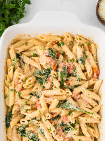 A white baking dish full of Boursin pasta.