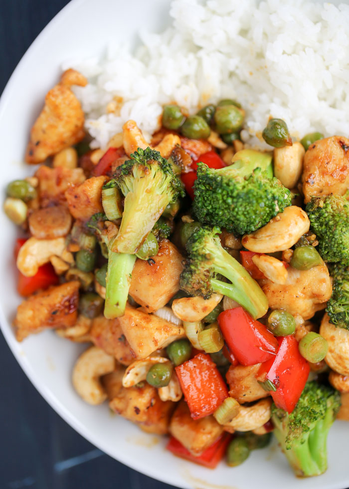 One Dish Two Ways: Cashew Veggie Stir Fry with tofu or chicken. Crisp veggies, crunchy cashews, and tofu for the vegans and chicken for the meat-eaters - all in a savory-sweet, slightly spicy sauce. This recipe cooks up in two pans at the same time, so the process can be a bit hectic. But it's well worth the effort!