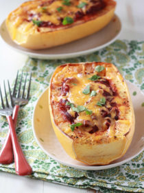 Chili Cheese Stuffed Spaghetti Squash - Melty cheddar and tangy chili make this a squash for squash haters. Who can turn down chili and cheese?! Make it your own by adding any chili you want (perfect for leftovers!)