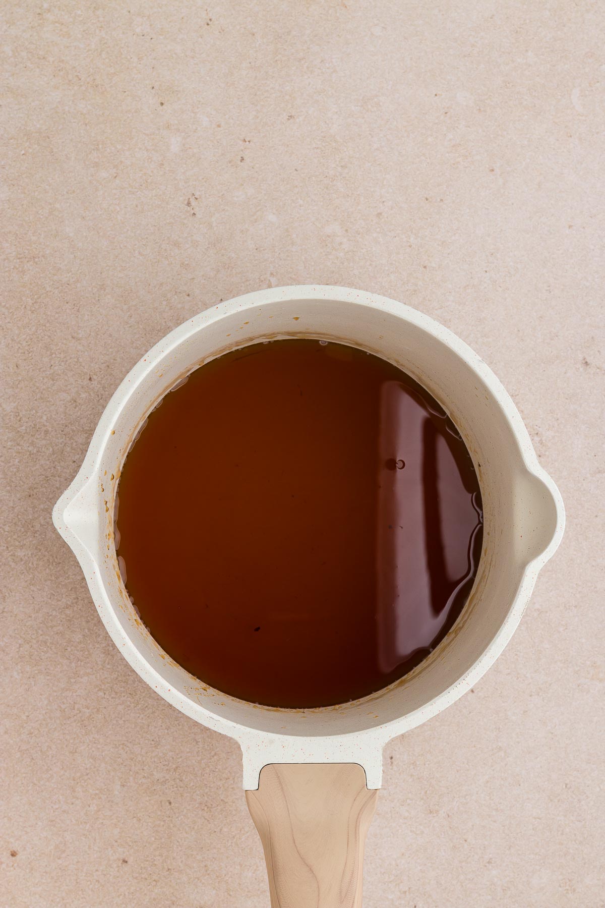 Cinnamon Dolce Coffee Syrup being made in a pan