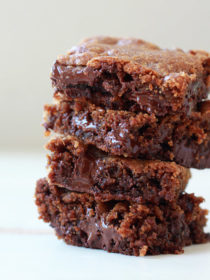 Coconut Oil Chocolate Chunk Blondies - No butter (or other dairy) in these gooey one-bowl blondies - coconut oil works perfectly in its place. But no coconut taste - just sweet caramelized bliss.