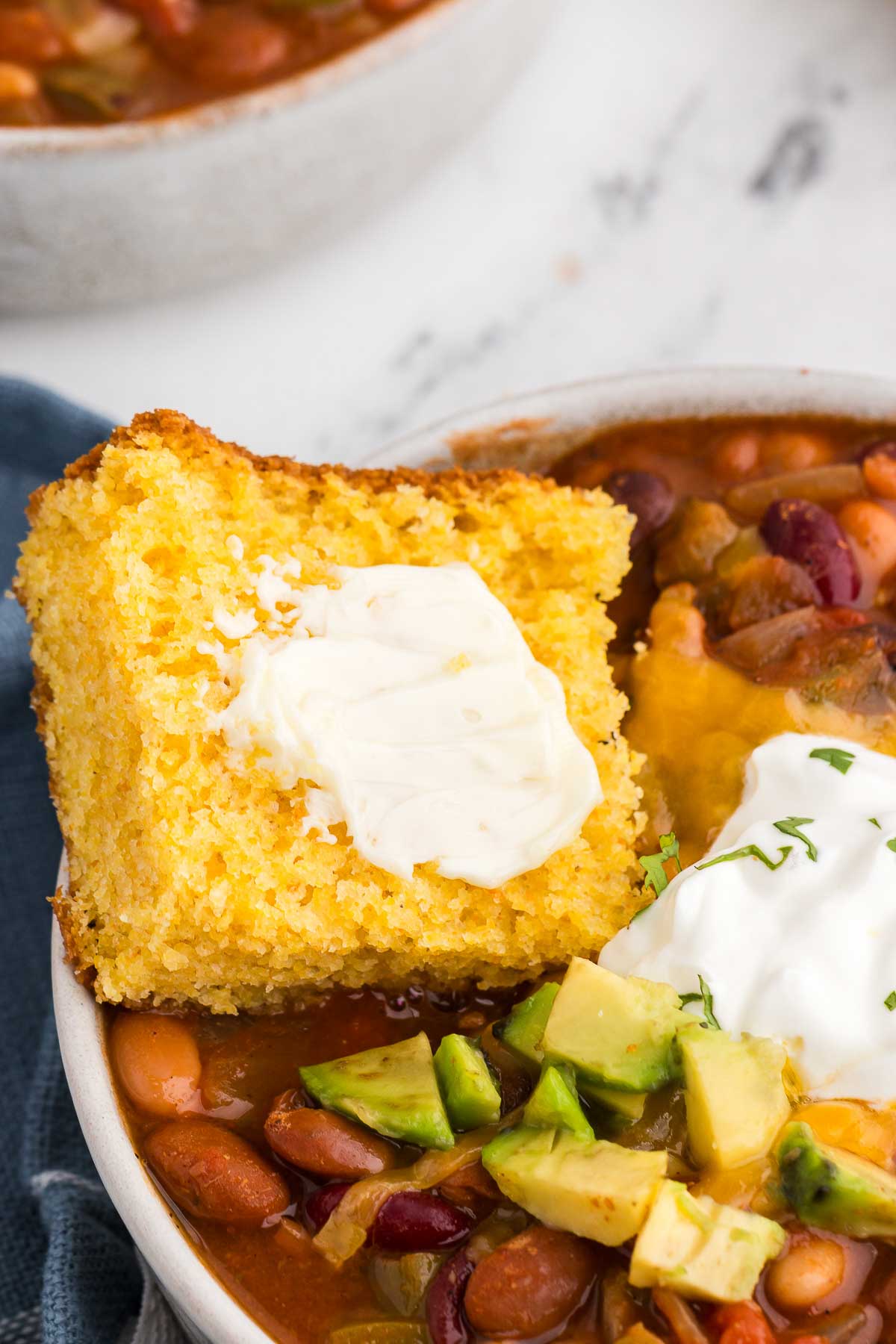 close up of Homemade Cornbread with butter in chili