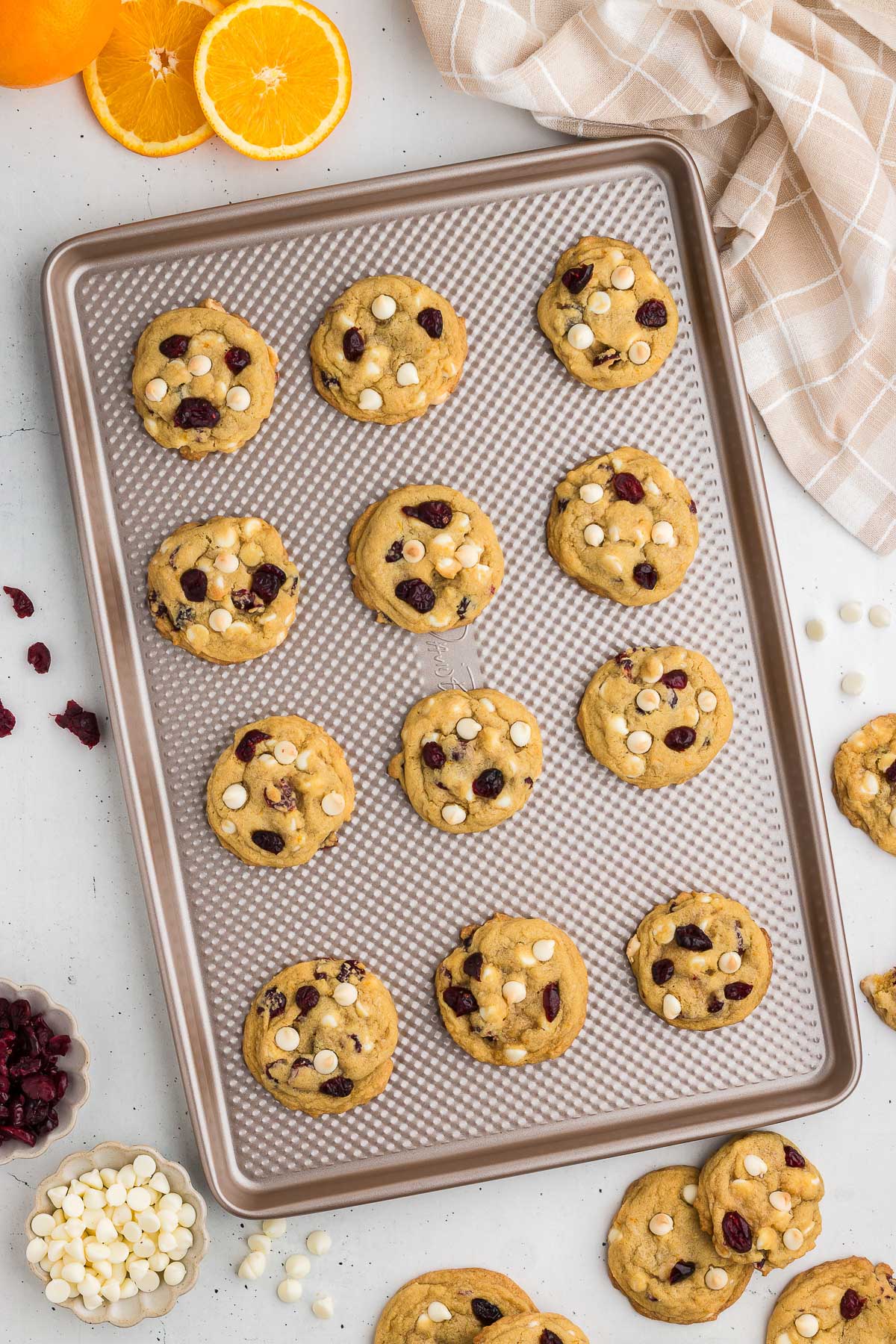 Cookie sheet with freshly baked Cranberry Orange White Chocolate Chip Cookies