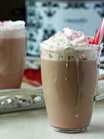 Slow Cooker Peppermint Vanilla Lattes - An easy Crock Pot latte recipe with festive mint and warm vanilla flavors. Stir it all together and come back two hour later to a coffee shop in your kitchen! (We love these on Christmas morning!)