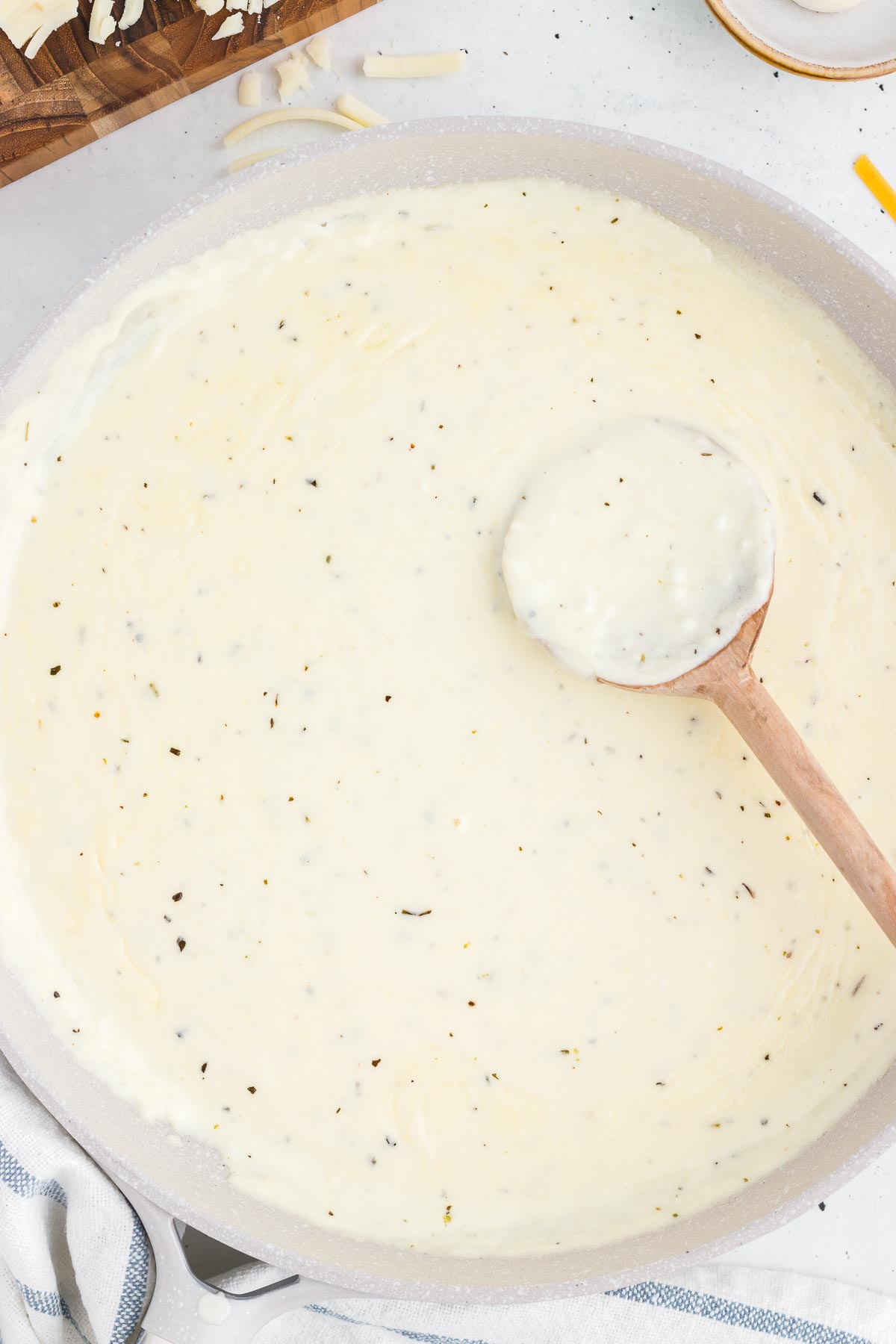close up of homemade alfredo in a skillet
