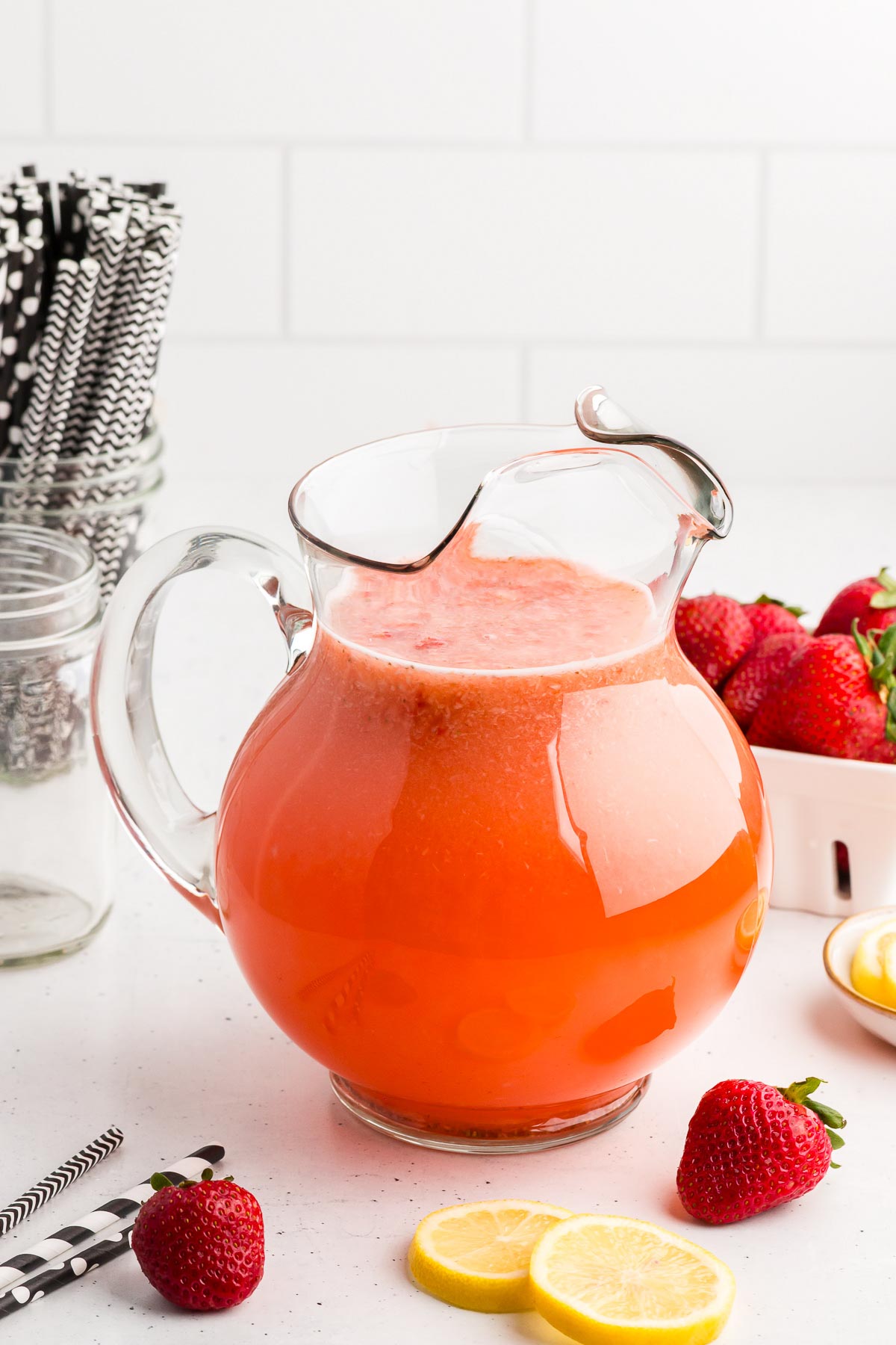 A pitcher full of Easy Strawberry Lemonade