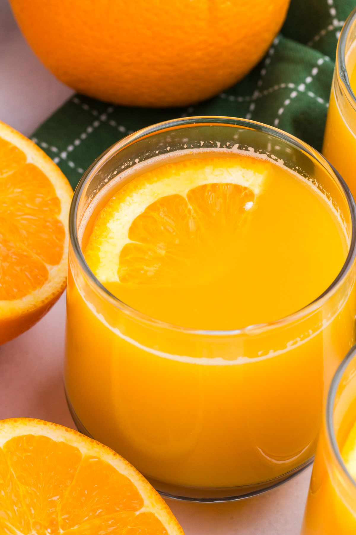 A close-up of a glass of orange juice