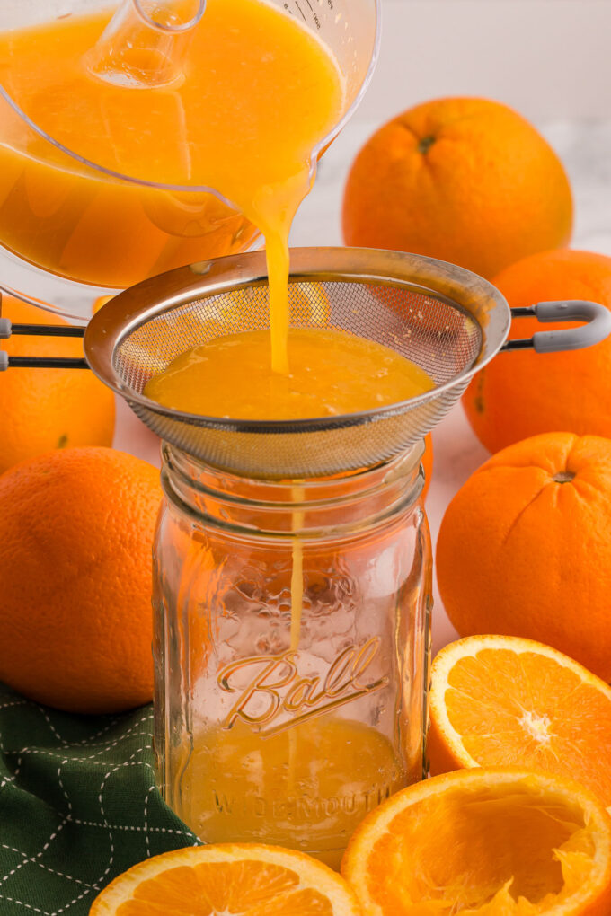 Straining the pulp out of fresh squeezed orange juice