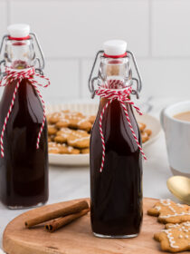 Two bottles of gingerbread coffee syrup with red and white twine