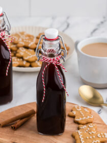 Bottle of gingerbread coffee syrup with red and white twine