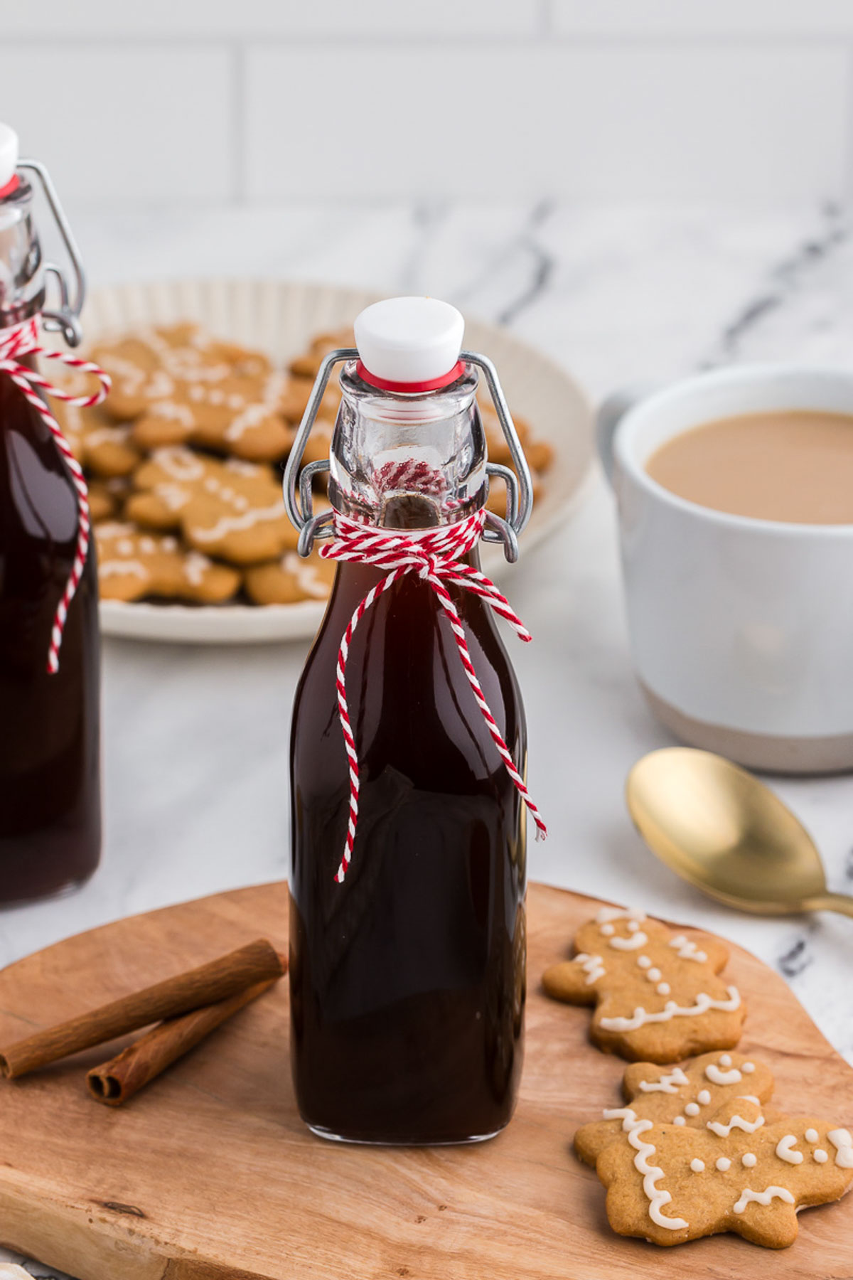 Bottle of gingerbread coffee syrup with red and white twine