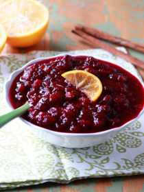 Orange Maple Cranberry Sauce - This easy homemade cranberry sauce recipe is sweetened with pure maple syrup instead of refined sugar. Orange and cinnamon lend subtle seasonal flavor without taking over. Make now and freeze for Thanksgiving!