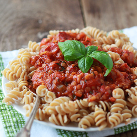 Red lentil pasta sauce over rotina pasta