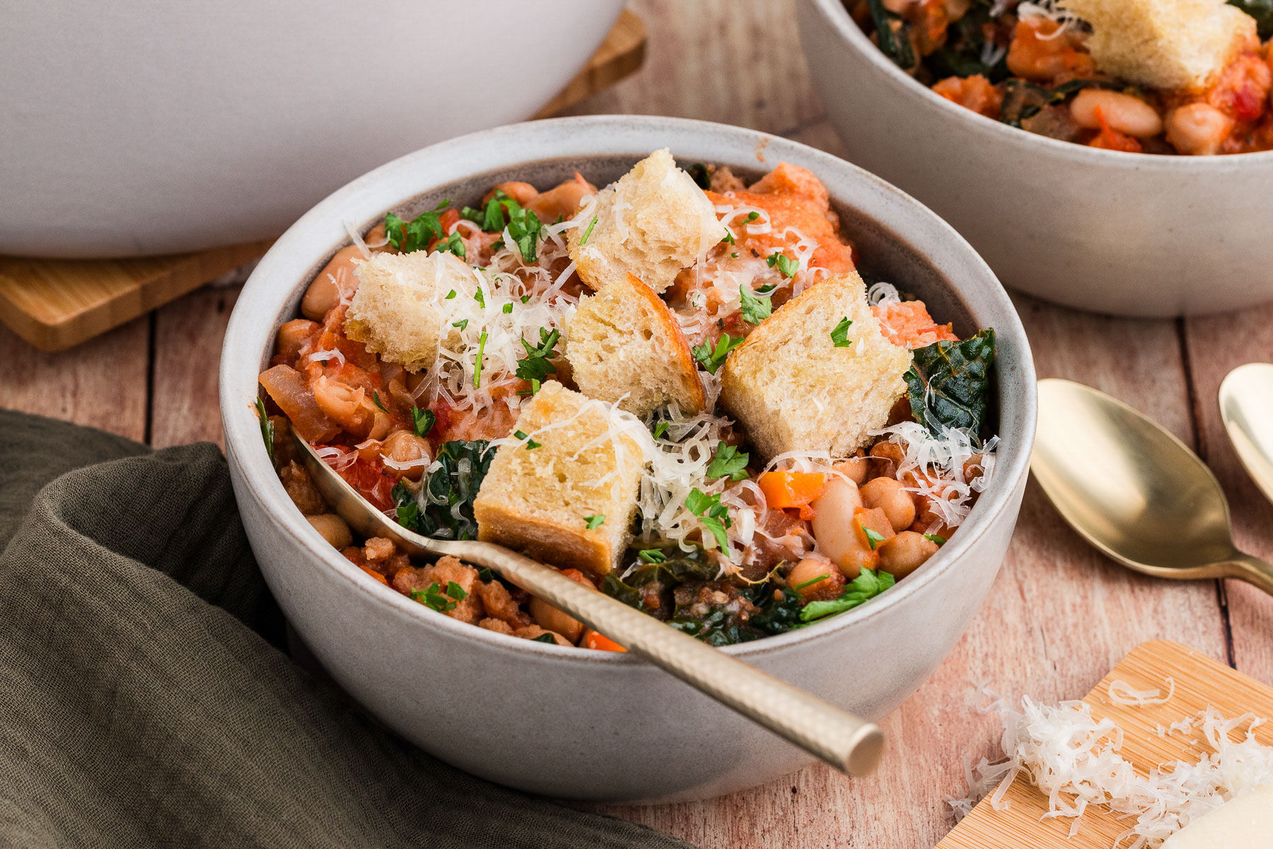 A white bowl full of ribollita
