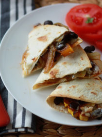 Smoky Delicata Squash & Black Bean Baked Quesadillas - Spicy seared delicata squash, blackened onions, black beans, and pepper jack, tucked inside a tortilla and baked until melty and golden. Serve with a little pico de gallo or fresh tomato slices and dinner's made!