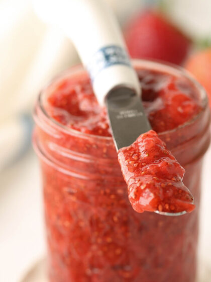 A glass jar full of strawberry chia seed jam
