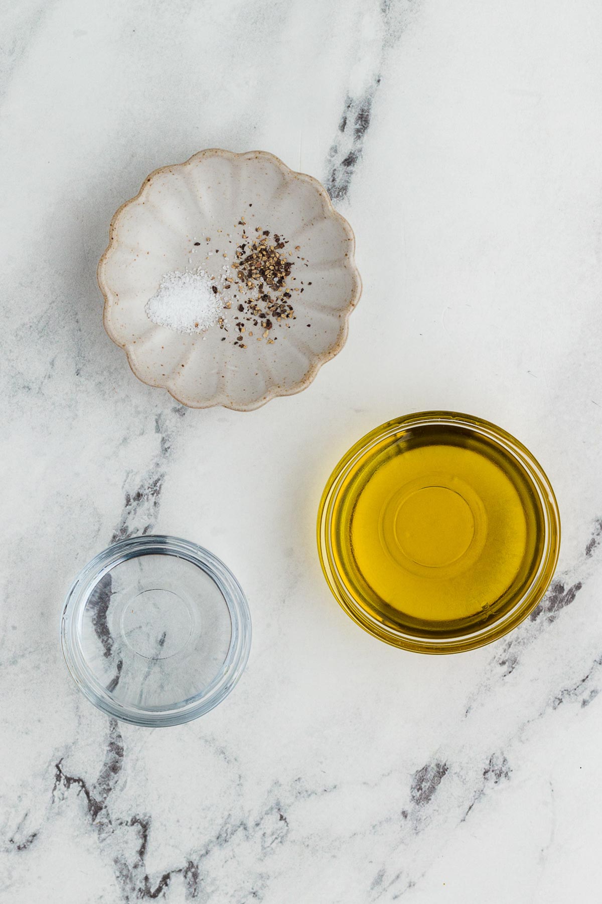 Ingredients for homemade vinaigrette on a white background