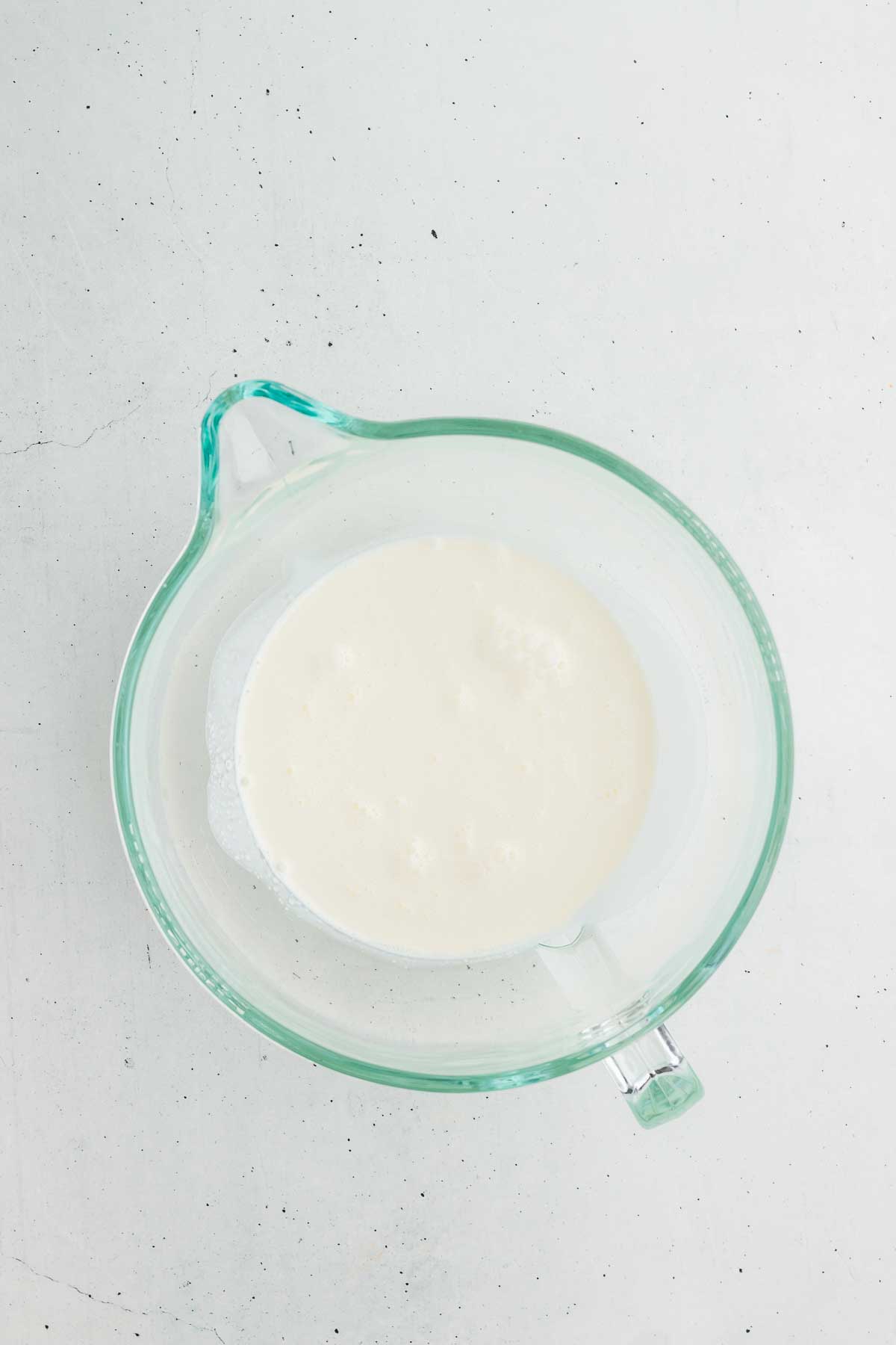 Heavy whipping cream in a mixing bowl for whipped cream